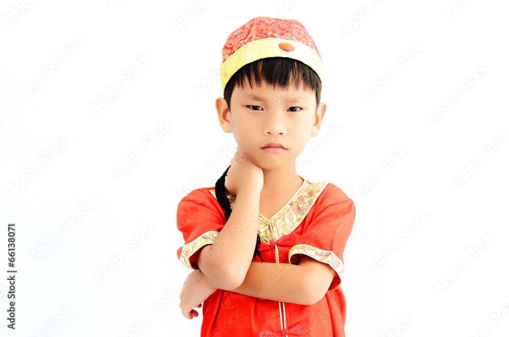 China boy in traditional Chinese red Tang suit greeting China boy in traditional Chinese red Tang suit greeting