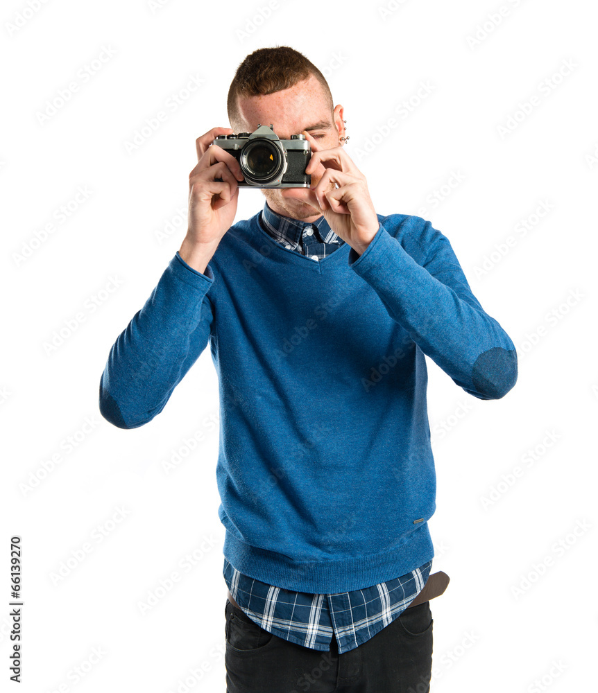 Man photographing over white background Man photographing over white background