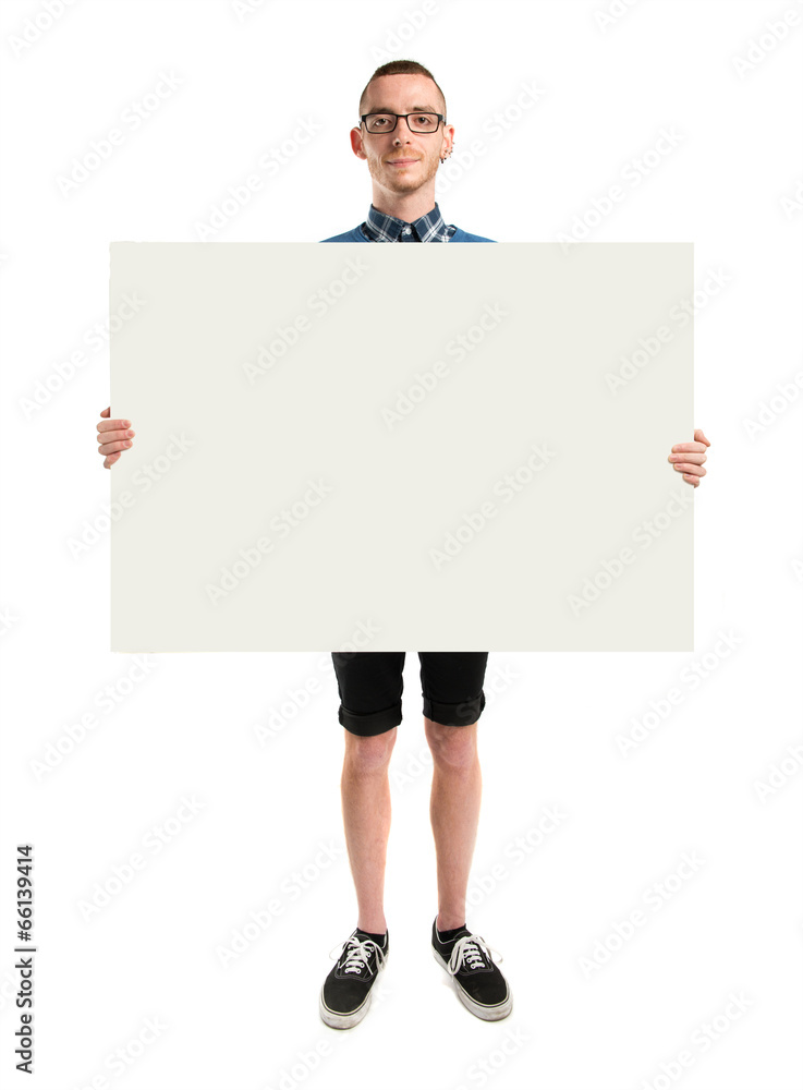 Redhead man holding an empty cardboard over white background Redhead man holding an empty cardboard over white background