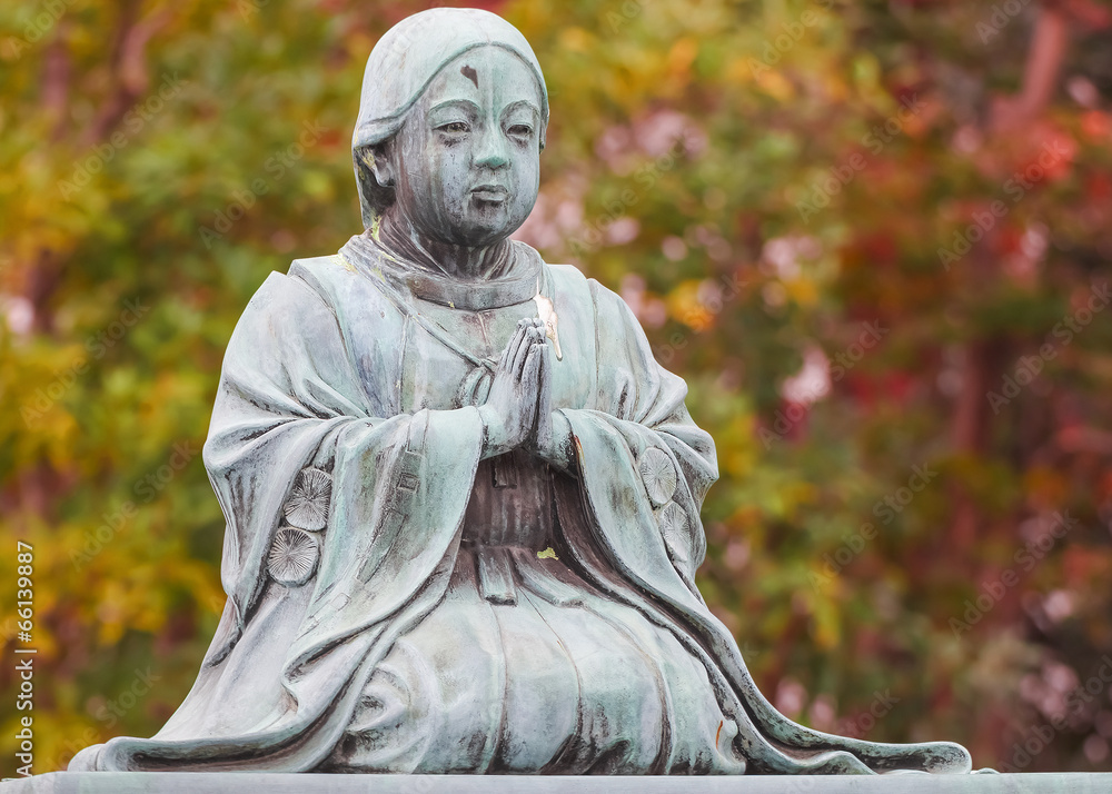 A Priestess Statue at Zojoji Temple in Tokyo A Priestess Statue at Zojoji Temple in Tokyo