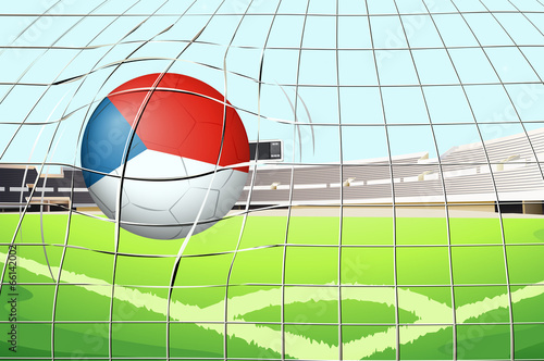 A ball at the field with the flag of Netherlands