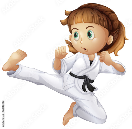 A brave young girl doing karate