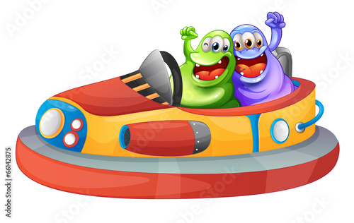 Two monsters playing with the bumpcars