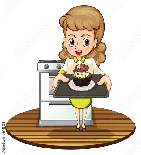 A lady baking a cupcake