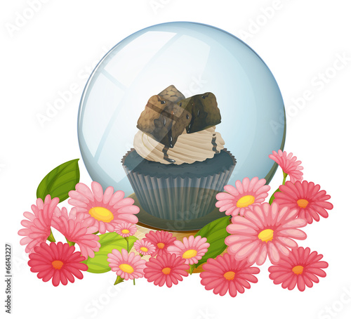 A crystal ball with a chocolate flavored cupcake