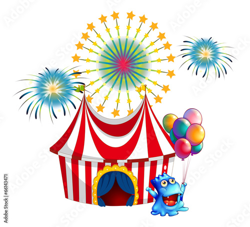 A circus tent with a monster in the front