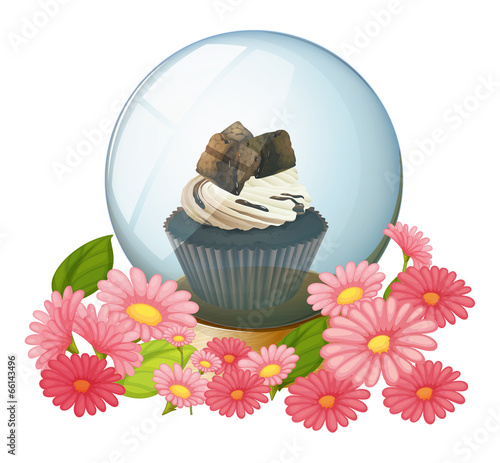 A chocolate cupcake inside the crystal ball
