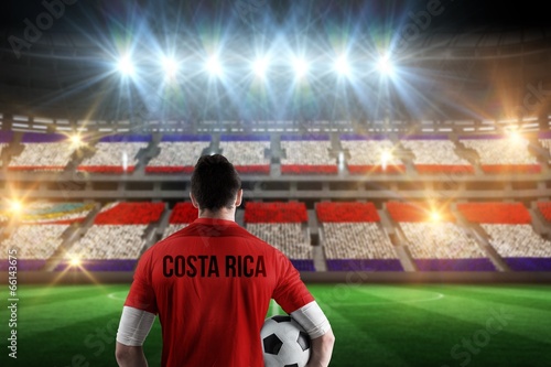 Composite image of costa rica football player holding ball © WavebreakMediaMicro