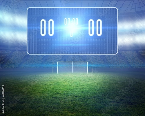 Football pitch with goalpost and scoreboard