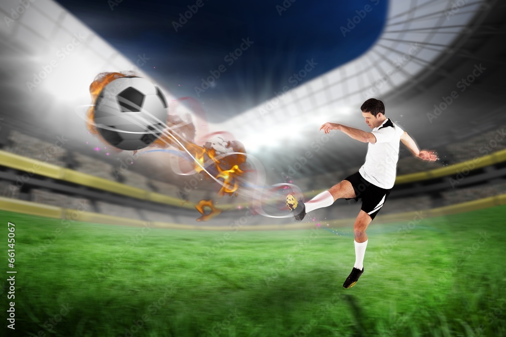 Naklejka premium Composite image of football player in white kicking