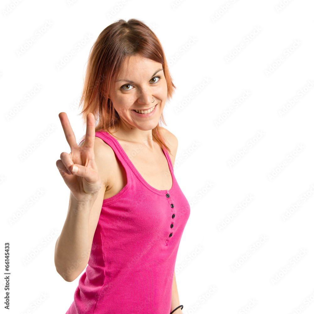 Pretty young woman winner over isolated white background Pretty young woman winner over isolated white background