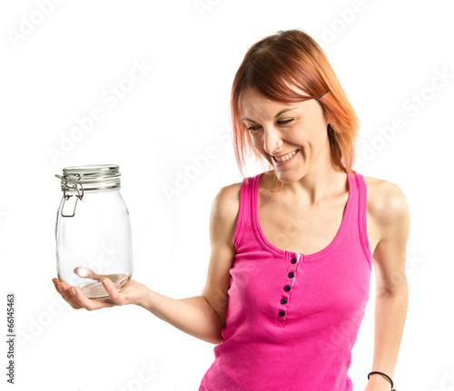 girl holding a empty bottle of glass