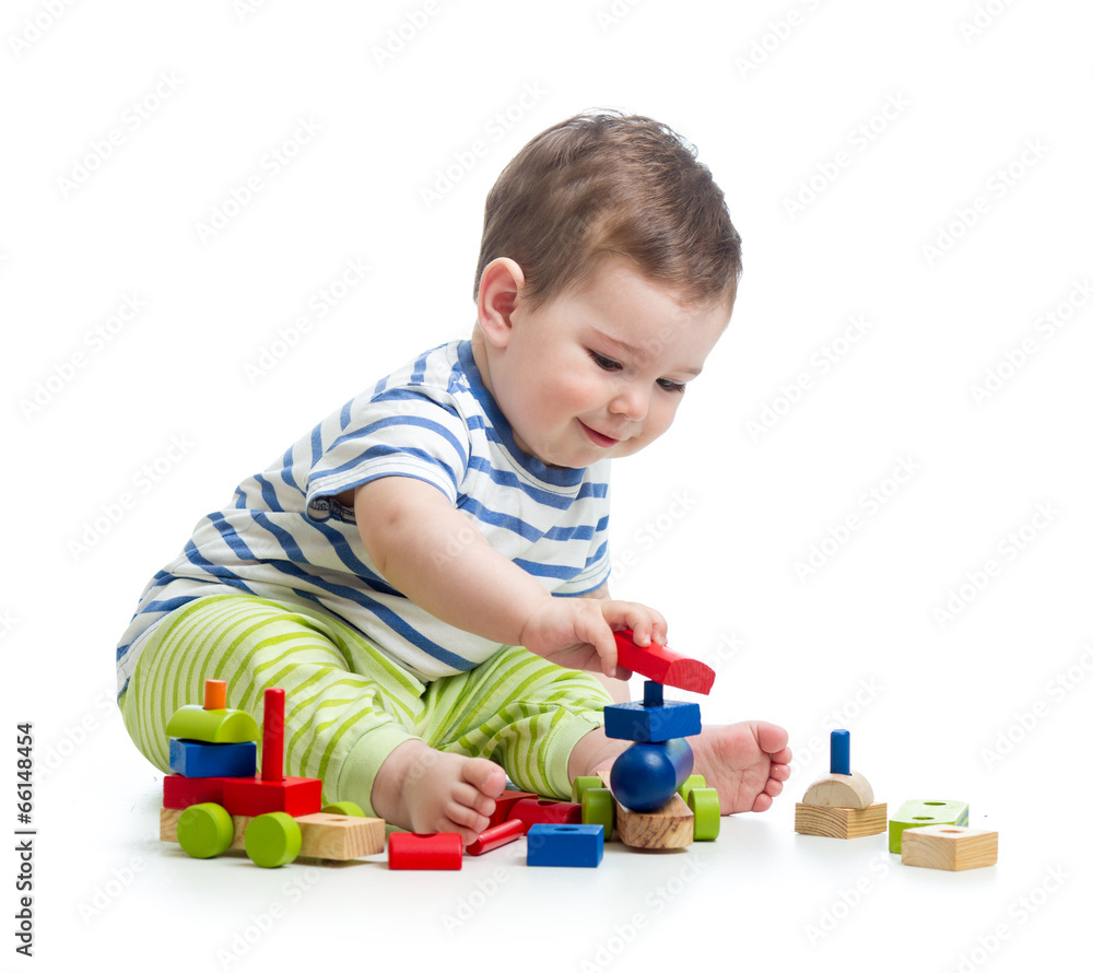 little cheerful child playing with construction set little cheerful child playing with construction set