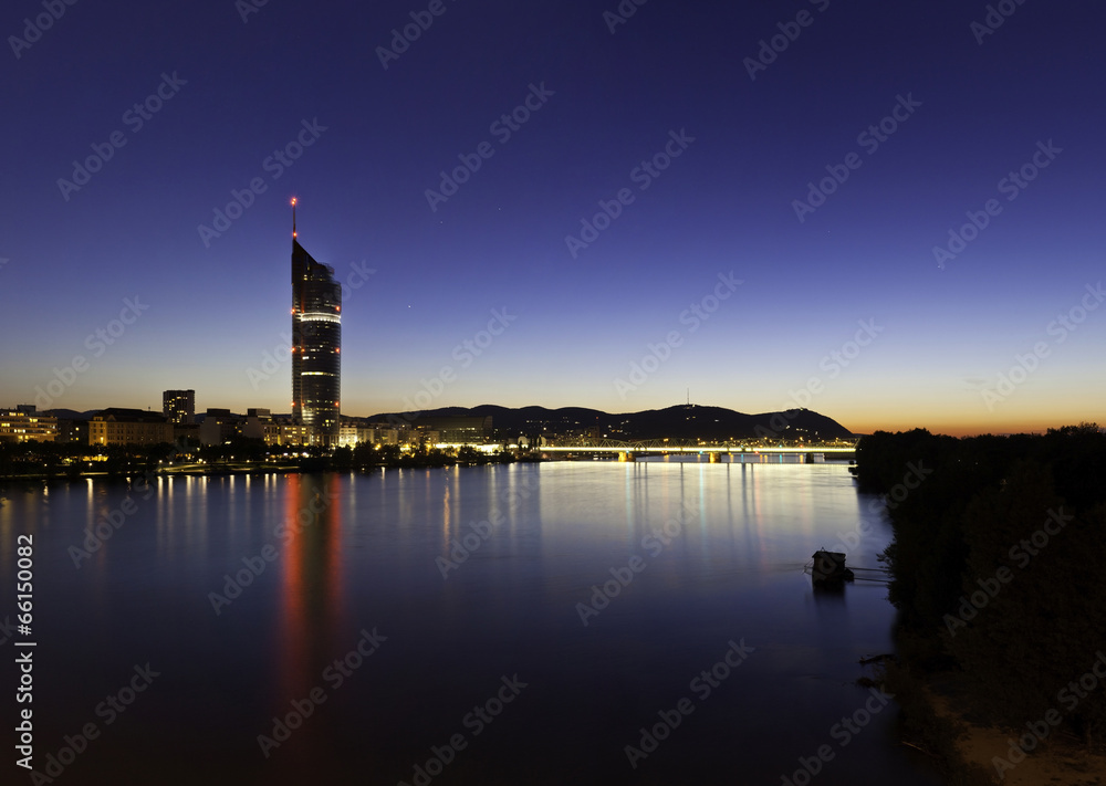 Vienna with the Millennium Tower and Danube River at night Vienna with the Millennium Tower and Danube River at night