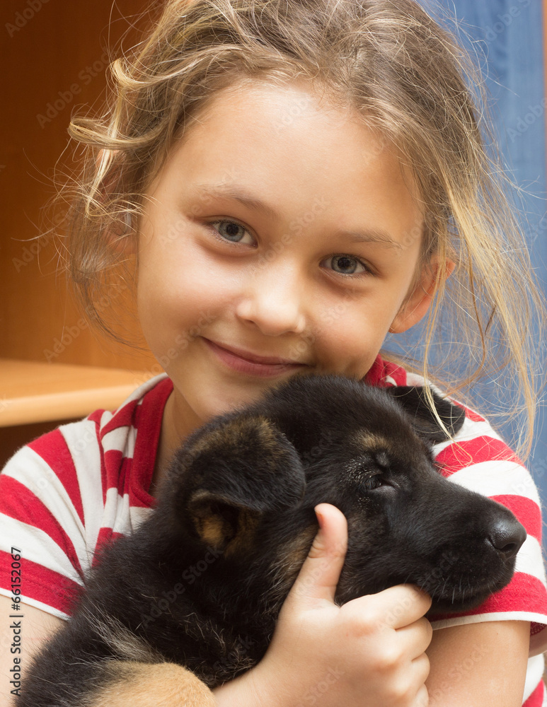 portrait of girl with a German Shepherd puppy portrait of girl with a German Shepherd puppy