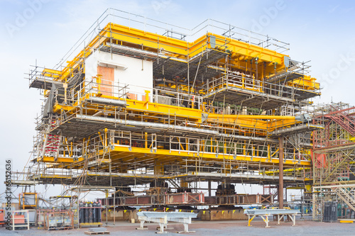 Oil rig, offshore drilling rig construction. May called oil platform, offshore platform consist of steel structure, pipeline and machinery for explore petroleum and natural gas, process and production