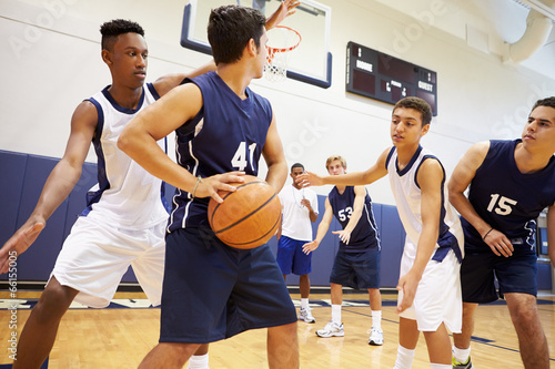 Male High School Basketball Team Playing Game © Monkey Business