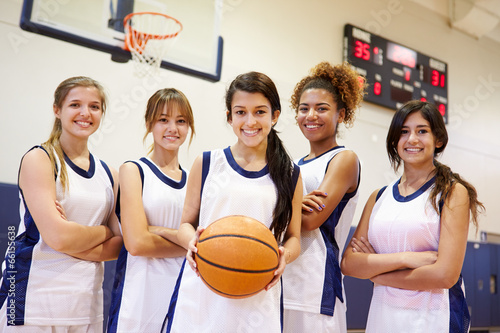 Members Of Female High School Basketball Team © Monkey Business