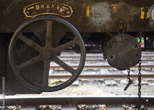 Brake wheel on old rusty train wagon on Nanu Oya train station in Sri Lanka. photo