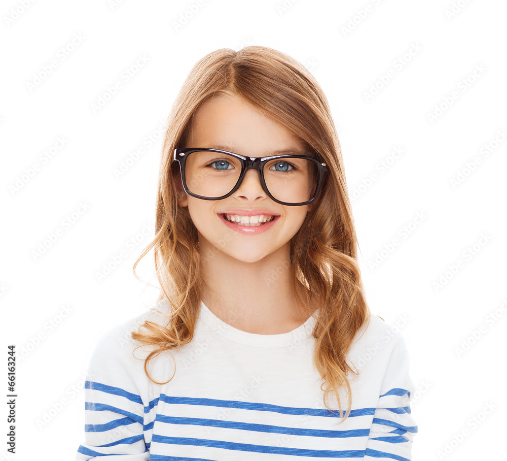 smiling cute little girl with black eyeglasses