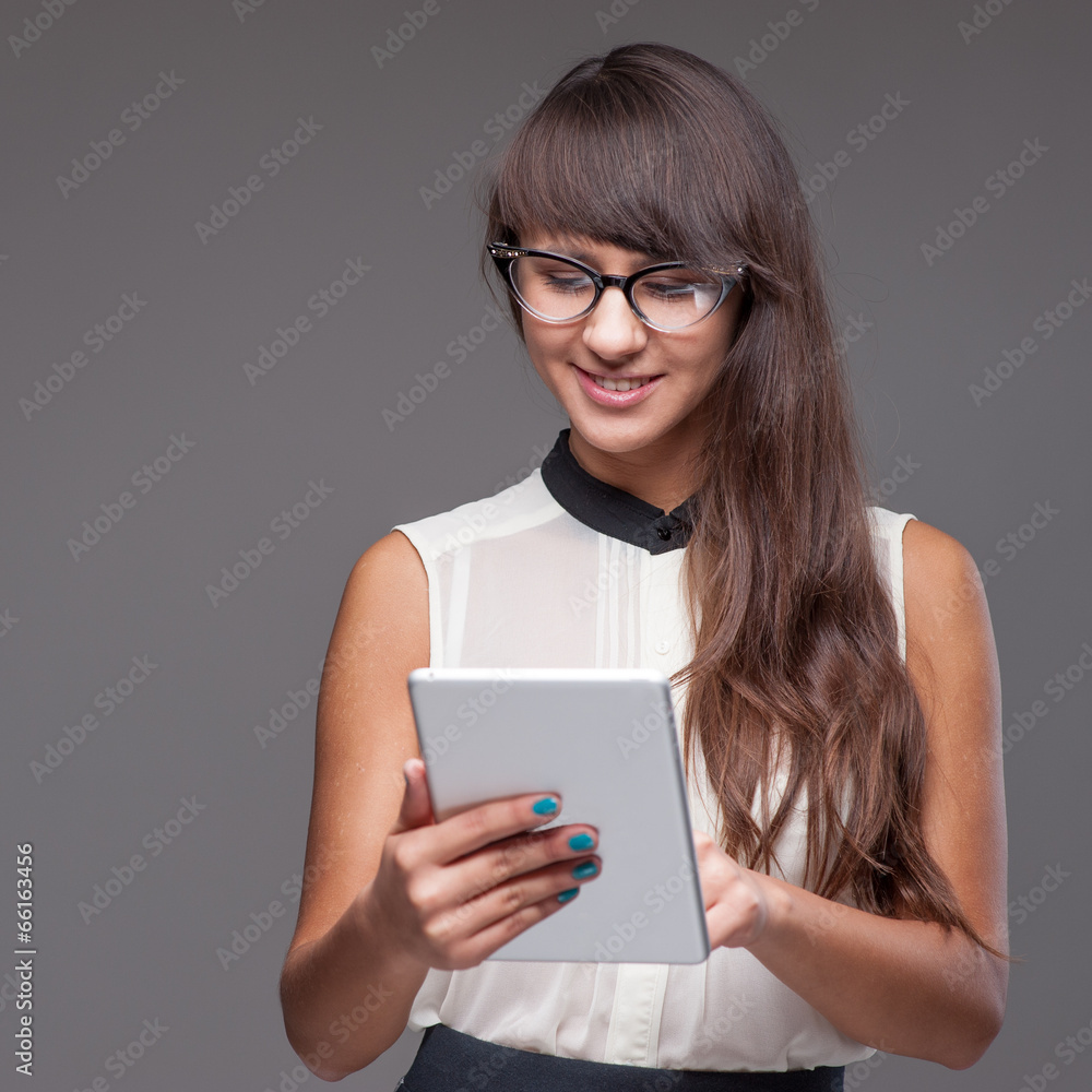 girl holding tablet