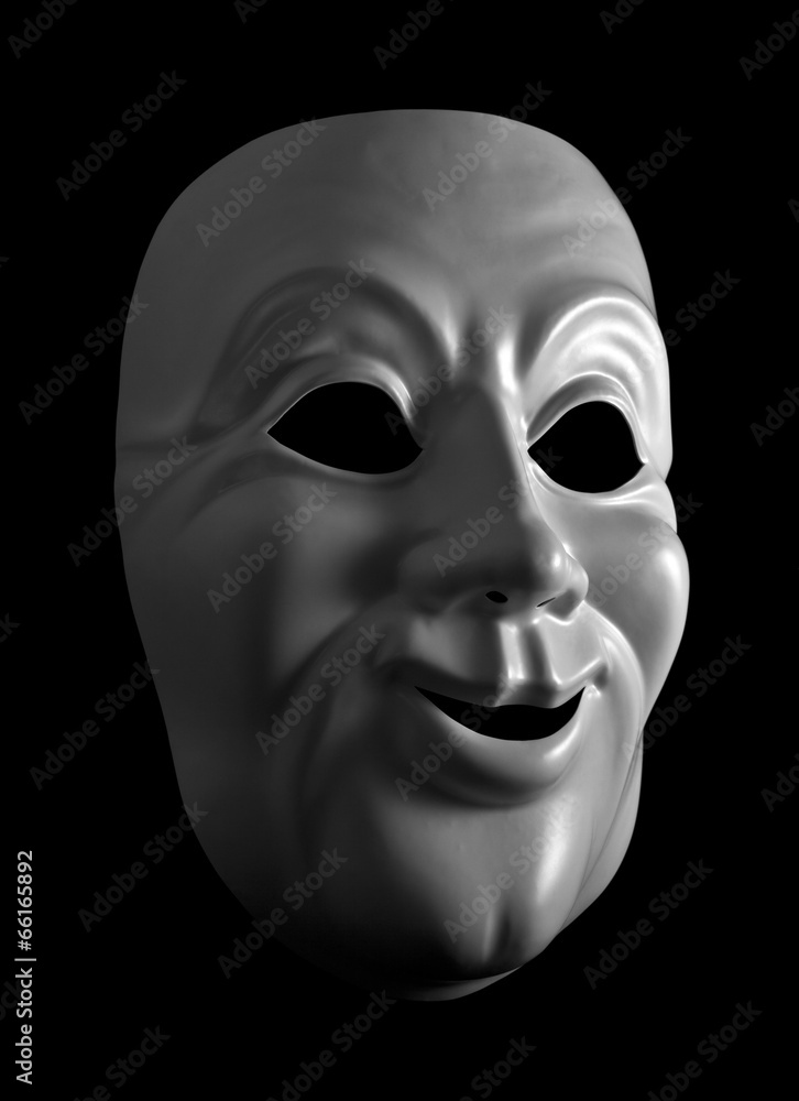 White mask against a dark background. White mask against a dark background.