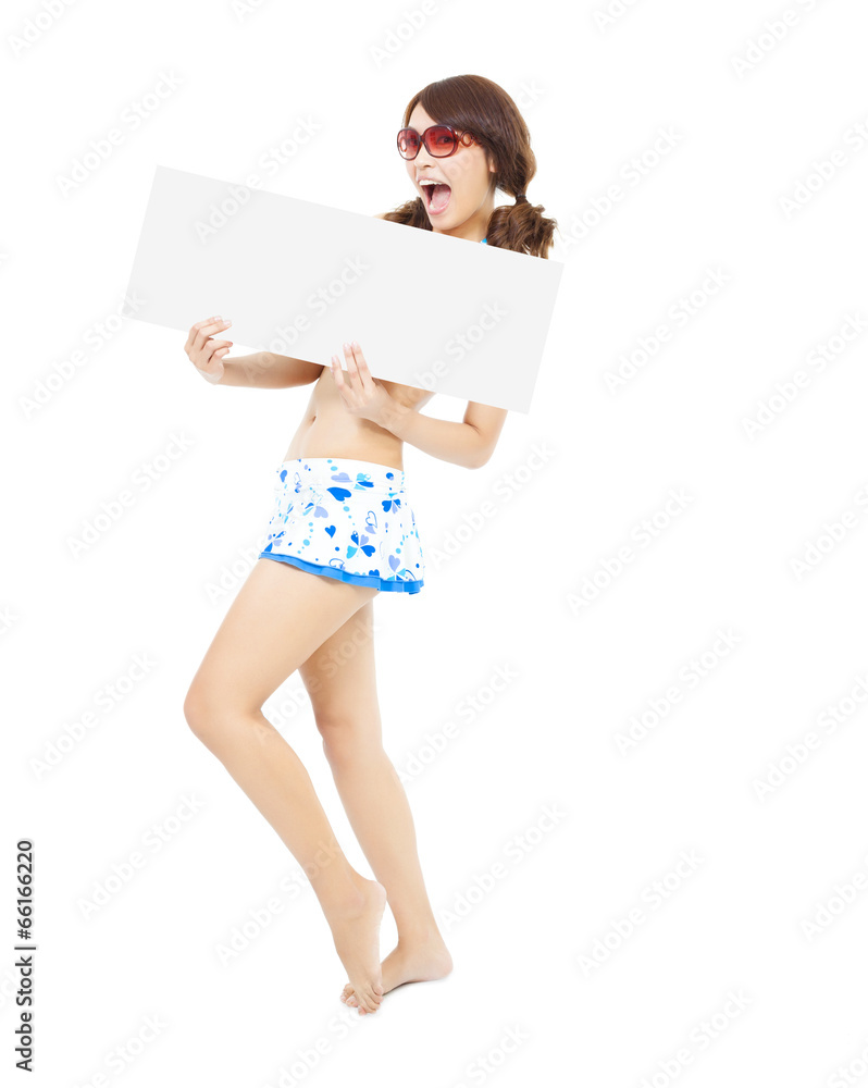 young girl wearing a swimwear and holding a white board young girl wearing a swimwear and holding a white board
