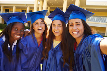 Group Of Female High School Students Celebrating Graduation