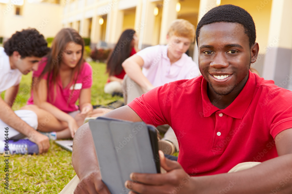 High School Students Studying Outdoors On Campus High School Students Studying Outdoors On Campus