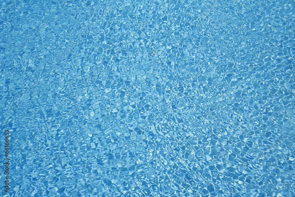 Water background - rippled blue sea water pool surface Water background - rippled blue sea water pool surface