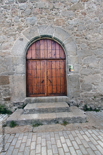 Puerta iglesia  de la Asunción, La Garganta de Baños, España photo