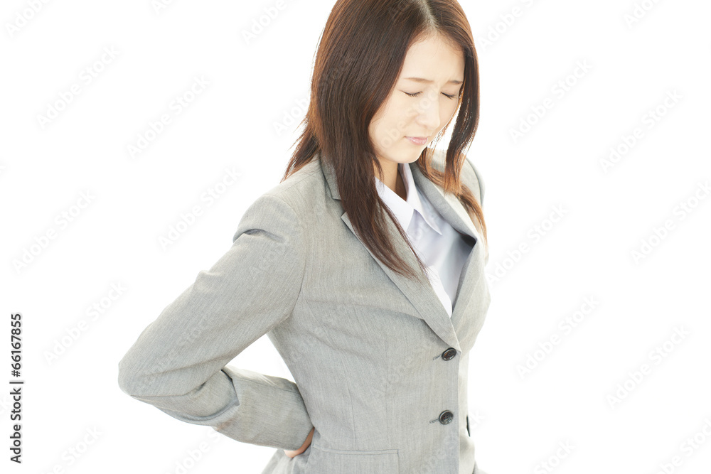 腰痛に悩むOL 腰痛に悩むOL
