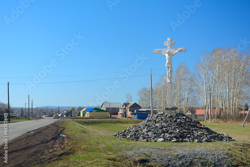 The crucifixion at the entrance to the village photo