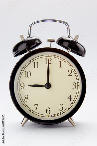Classic alarm clock at 9 O'clock