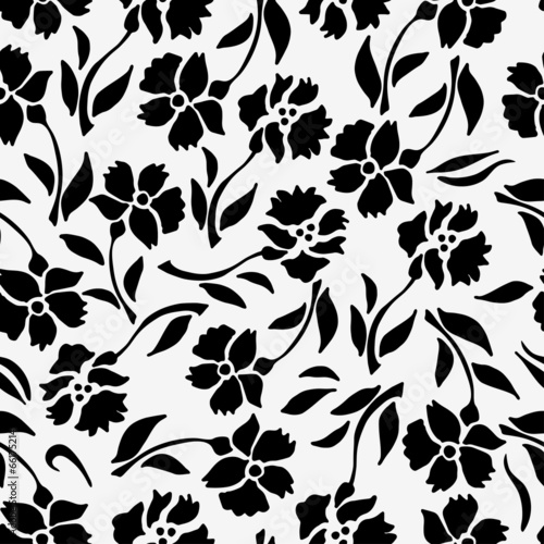 Seamless pattern with black flowers on a white background
