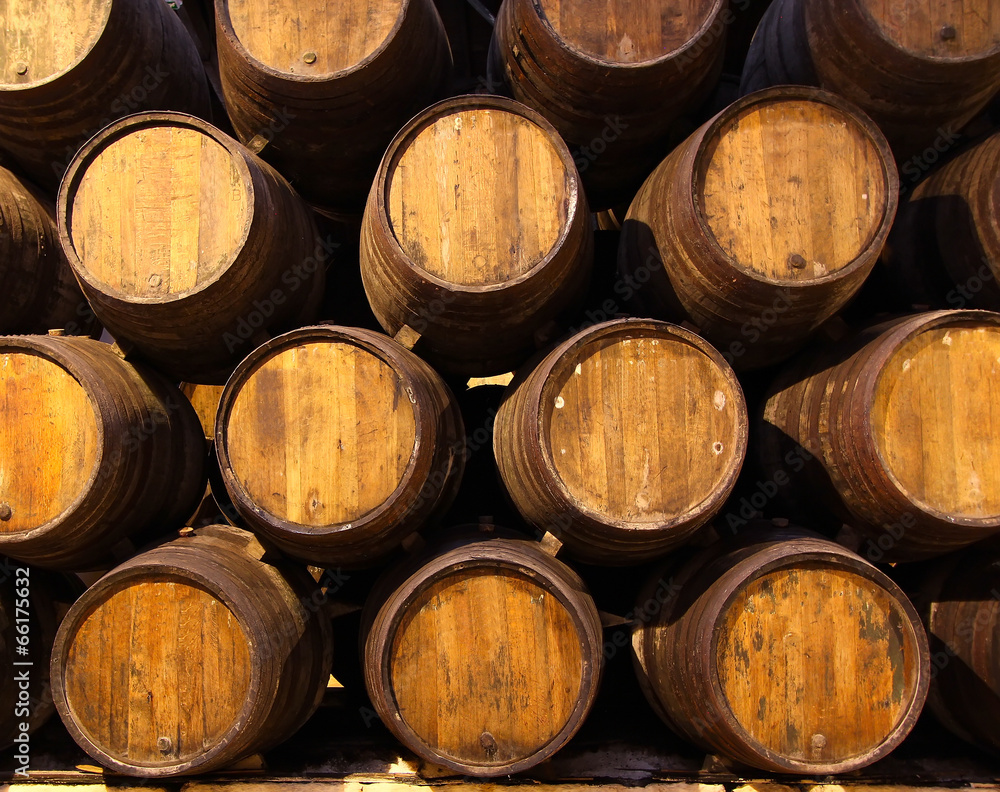 Row of wooden barrels of tawny portwine