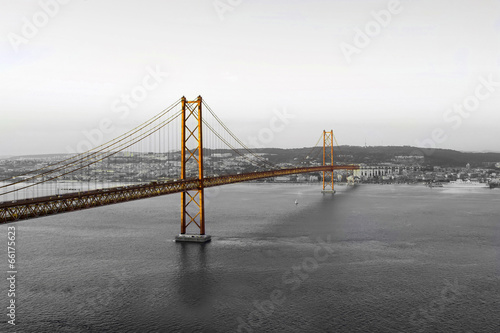 Golden Bridge on a monochromatic background, evening in Lisbon