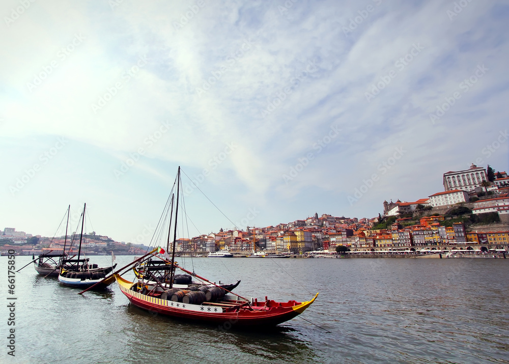 Douro riverside and boats with wine barrels, Porto, Portugal Douro riverside and boats with wine barrels, Porto, Portugal
