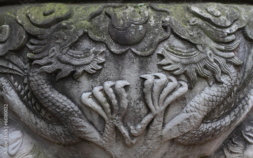 flying twin dragons , stone carving