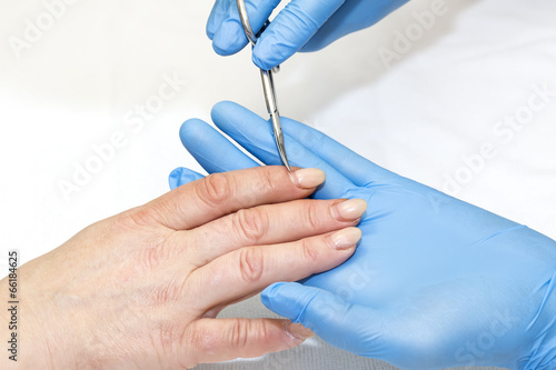 woman doing manicure beauty salon