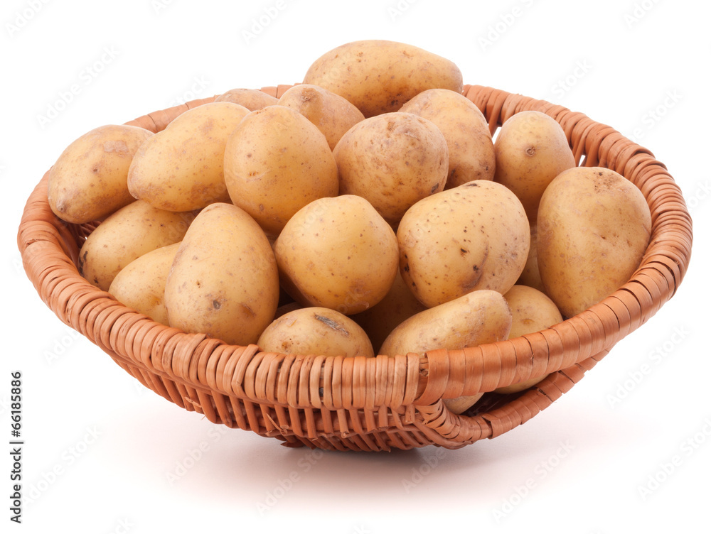 Potato tuber in wicker basket isolated on white background Potato tuber in wicker basket isolated on white background