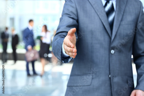 Canvas-taulu Businessman extending hand to shake