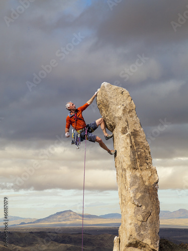 Fotografie Climber on the edge.
