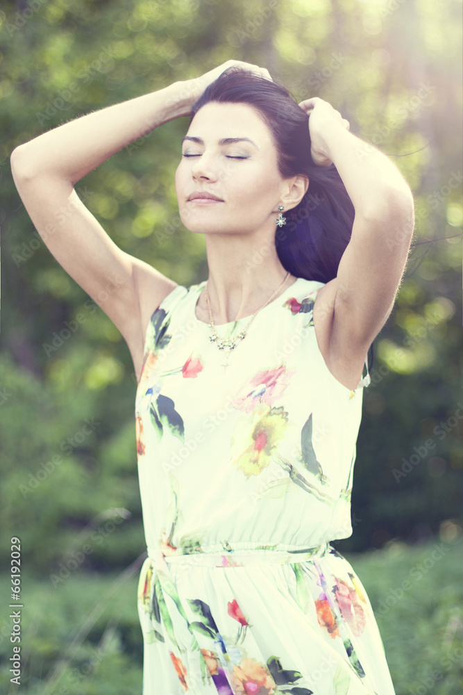 Beautiful woman in a summer dress Beautiful woman in a summer dress