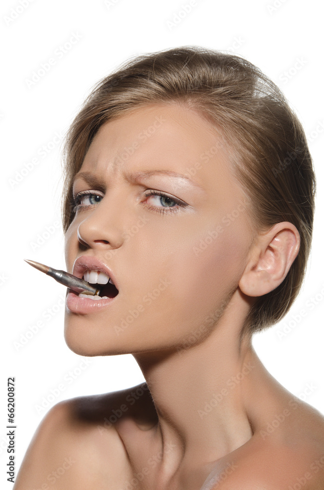 Portrait of woman with bullet in mouth Portrait of woman with bullet in mouth