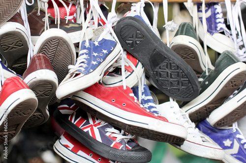 Tableau sur toile Sneakers of old shoes second hand.