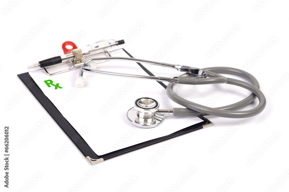 Prescription on clipboard and stethoscope. Prescription on clipboard and stethoscope.