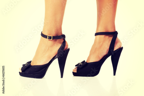 Woman's legs and high heel shoes