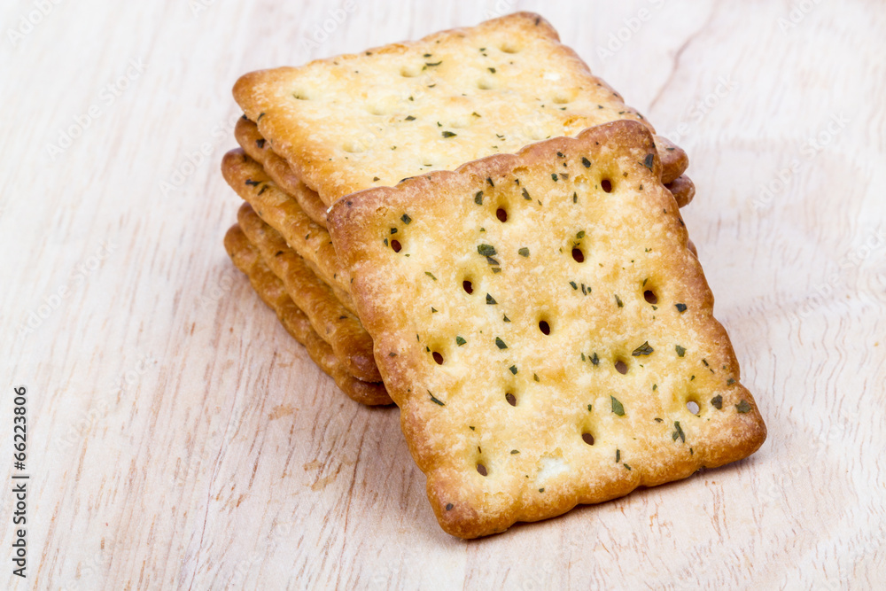 Vegetable cracker on wooden background Vegetable cracker on wooden background