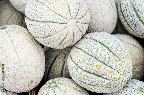 ripe melons on a desk of market in italy